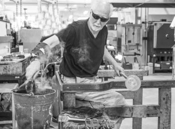 Wetting the block to shape the glass.